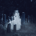 Ghostly woman in white dress appears among old gravestones on a foggy Fripp Island night.