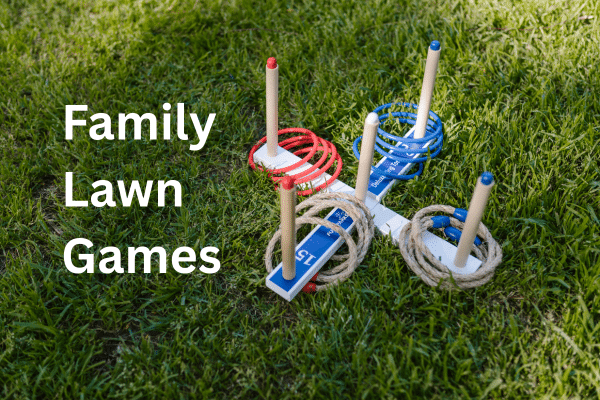A ring toss game with rope rings on pegs sits on green grass. Text reads Fripp Island Family Lawn Games.